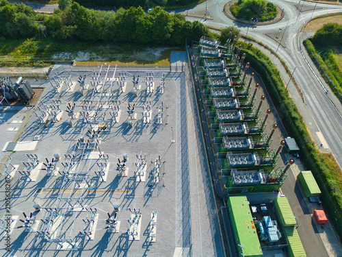 Aerial view of industrial generator compressor units for power generation at small electrical substation