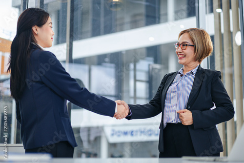 Business Women Handshake in Office Setting Professional Agreemen