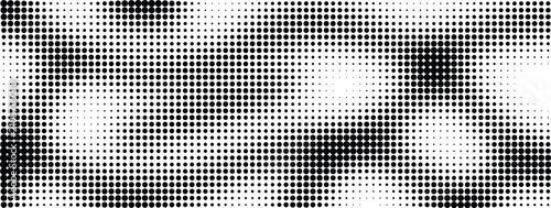 Photos Abstract halftone pattern background with black dots of varying sizes