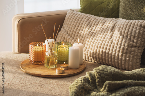Картината върху платно Home interior creating cozy relaxing atmosphere with candles and aroma diffuser