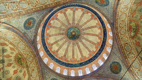 Fotografie Istanbul, Turkey - July 11, 2026: View of the painted domes inside Sultanahmet M