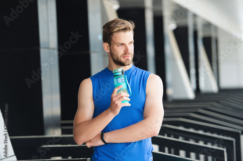 Vászonkép Sport man thirst drinking water