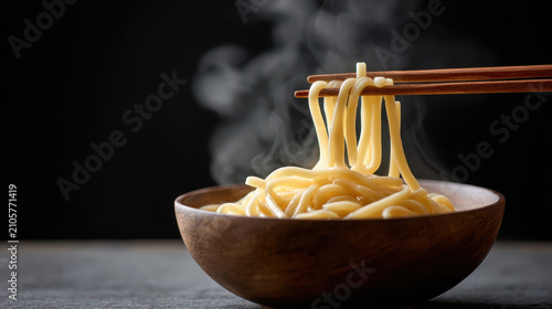Chewy Udon Noodle Bowl with Chopsticks and Steam