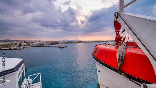 Obraz na plátne Ferry sailing near Kos island at sunset with breathtaking coastal landscape