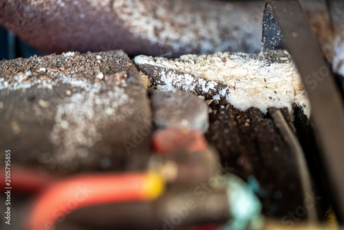 Bild auf Leinwand Heavy sulfate buildup and corrosion deposits on truck lead acid battery showing