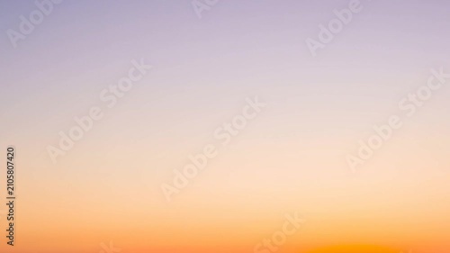 Shifting smooth sky gradient showing gradual desaturation at sunrise, caused by rising sun light