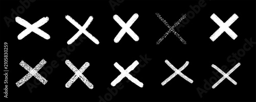 Chalkboard x marks and crosses pattern on black background