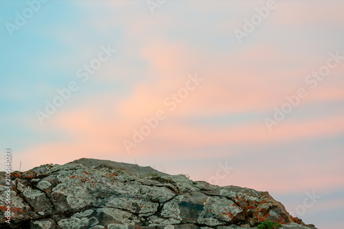 Empty Rock Podium Against the Evening Sky