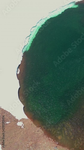 High Altitude Aerial View of Alpine Crater Lake in Extinct Volcanic Mountain Range