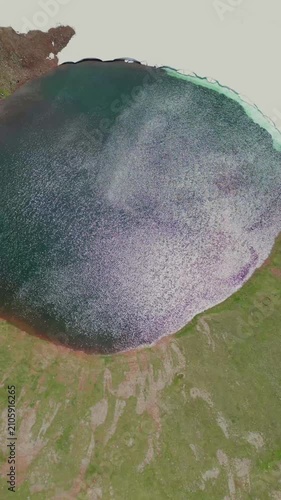 High Altitude Aerial View of Alpine Crater Lake in Extinct Volcanic Mountain Range