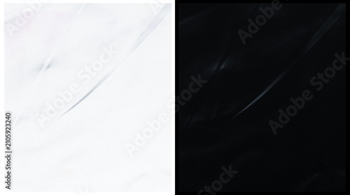 Minimalist plastic texture background, crumpled white and black polyethylene film overlay, abstract wrinkled synthetic material surface for design