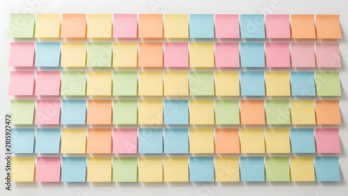 171. [STYLE] of a creative brainstorm wall of blank colorful notes showing layered square papers in a gradient mosaic with paper-edge shadows and fingerprint-smudge textures, even gallery lighting, sh