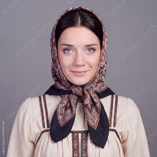 Studio portrait of a young beautiful brunette model