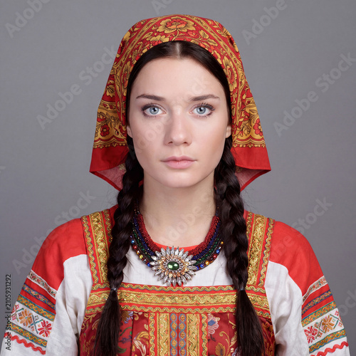 Studio portrait of a young beautiful brunette model