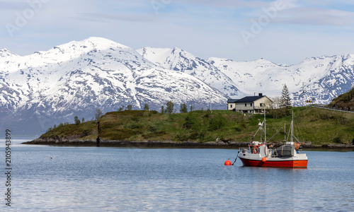 fishing boat near the village Koppangen in northern Norway on the western side of the Lyngen Alps on the Lyngenfjord, Troms county, Norway