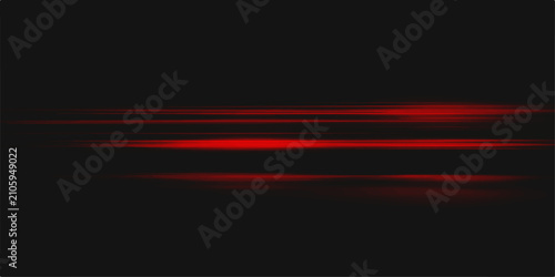 Schilderij op canvas Abstract red light streaks with bokeh effect against a dark background, evoking a sense of speed and mystery