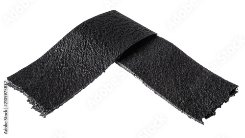 Foto Isolated black textured synthetic leatherette strip, wrinkled and folded object