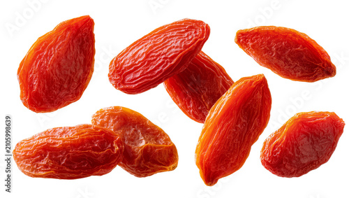 Fotografía Isolated group of vibrant dried goji berries, healthy organic superfood ingredie