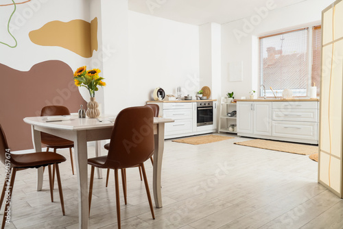 Interior of light kitchen w...