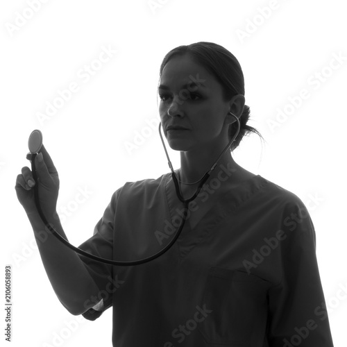 Silhouette of female doctor with stethoscope on white background