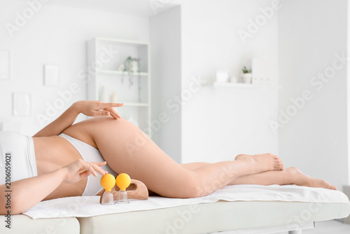 Young woman with scraper an...