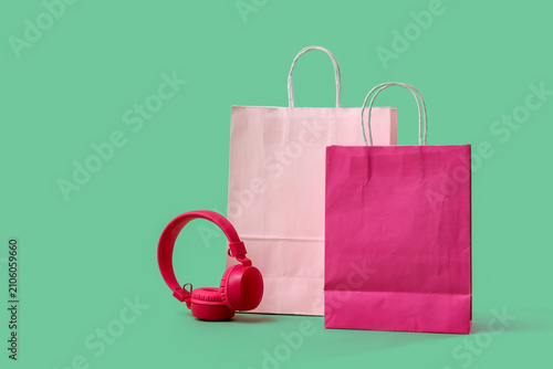 Pink shopping bags and mode...