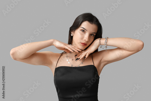 Beautiful young woman with ...