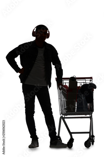 Silhouette of young man wit...