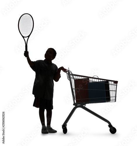 Silhouette of little boy wi...