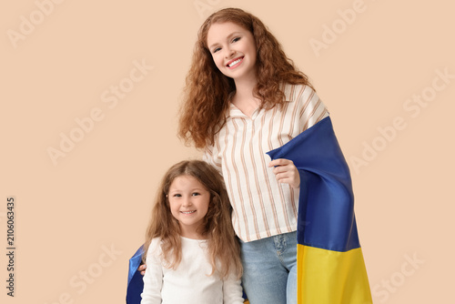 Happy little girl and her m...