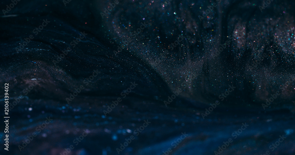 Fototapeta premium Dark ink flow. Defocused sparkling texture. Black blue night color dye blending in glitter cosmic liquid wavy abstract background.
