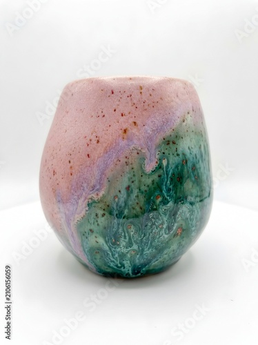 Artisan Ceramic Vessel Featuring a Reactive Glaze Blend of Soft Pink, Lavender and Speckled Teal-Green, Studio Product Photography on White Background