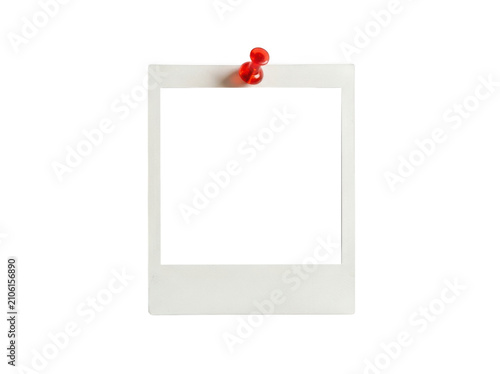 Blank polaroid photo frame with a red push pin