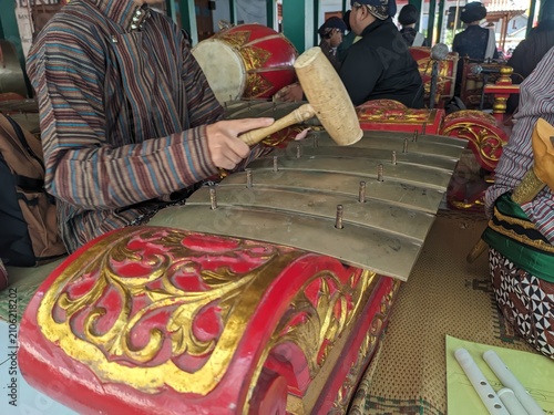 Javanese gamelan musical instruments being played
