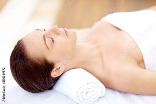 Peace, spa and wellness with woman at hotel for zen, deep tissue massage or beauty treatment. Holistic detox, hospitality and healing retreat with person at resort for body care, relax or eyes closed