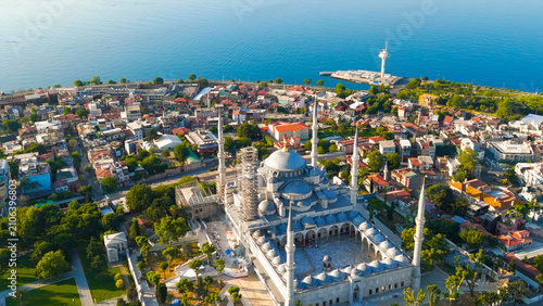 Istanbul, Turkey. Morning sunlight on Blue Mosque courtyard. Close aerial view of minarets and Ottoman architecture at Sultanahmet. Aerial View