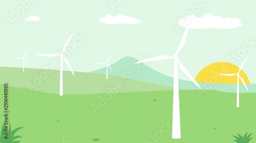 Wind Turbines Rotating in Green Field At Sunset