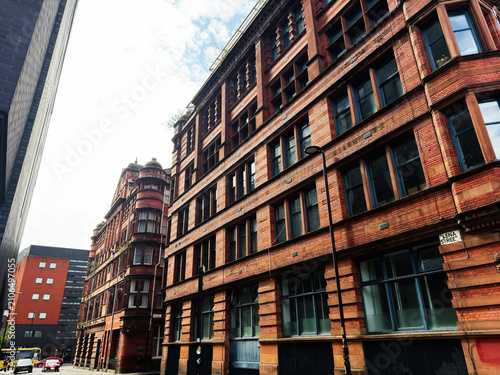Fotografie Red brick Victorian commercial building facade on Lenna Street in Manchester, UK