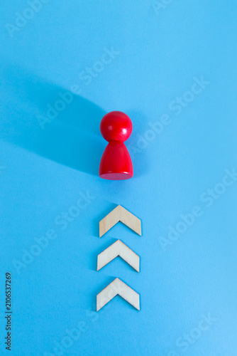 Bild auf Leinwand Red figure ascending with career growth arrows