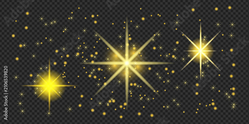 Set of yellow glowing light stars, sparkles, and glitters on a dark transparent background