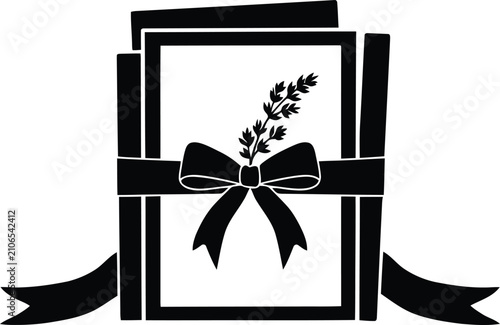 Black silhouette of a gift box with ribbon and sprig