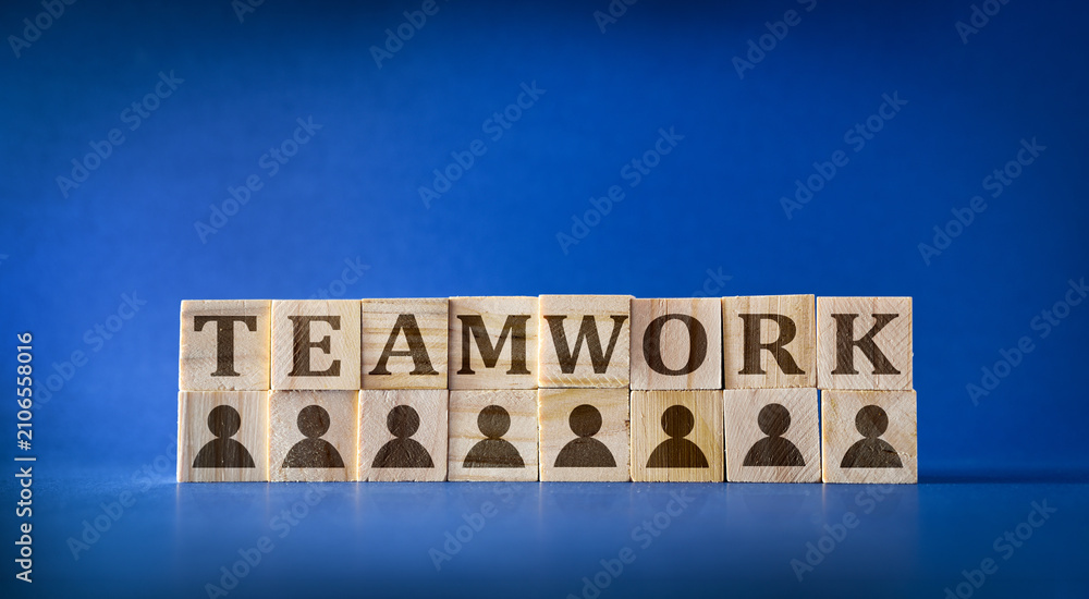Obraz premium Teamwork Concept with Wooden Blocks and Icons