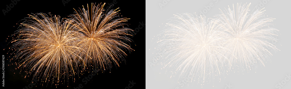 Obraz premium Golden fireworks explosion in the night sky. Festive pyrotechnic display isolated on black background