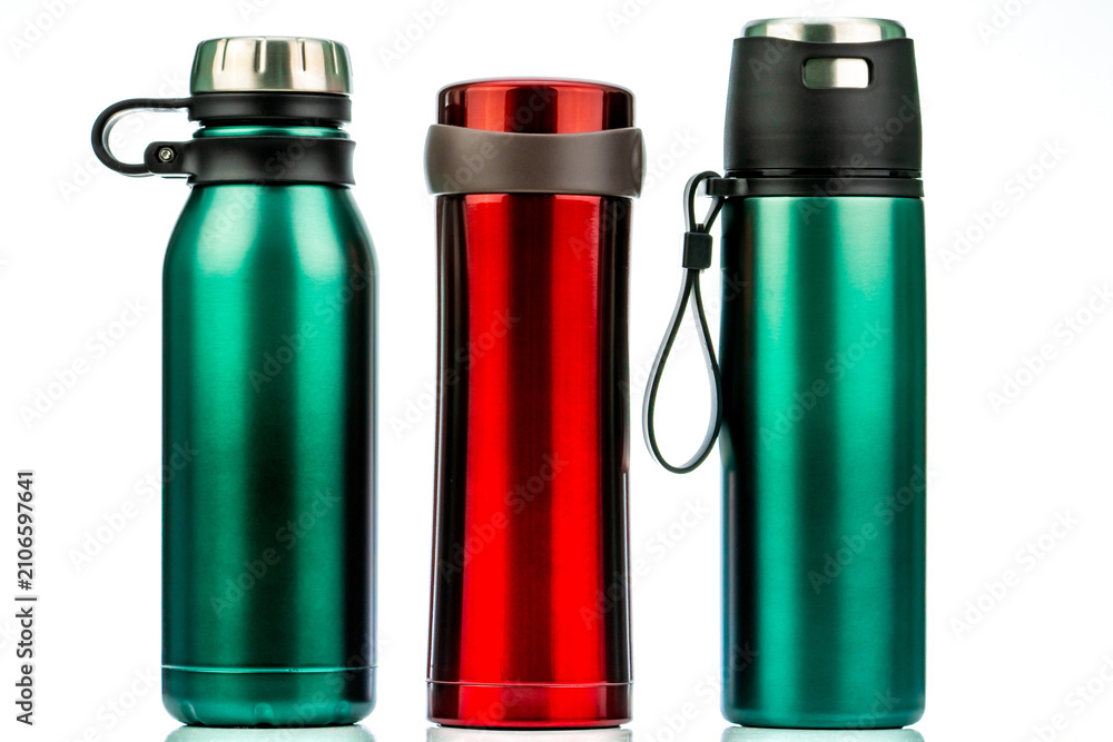 Obraz premium Reusable stainless steel insulated thermos bottles for coffee, tea, water. Modern travel drink containers with vacuum insulation and zero waste lifestyle. Sustainable hydration and eco friendly living