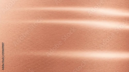 Brushed copper or rose gold metallic surface background. Shiny abstract metal texture wallpaper for luxurious design, decorative packaging, and technology backdrop.