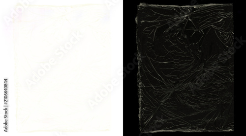 фотографія Crumpled plastic wrap texture on black background, transparent cling film overla