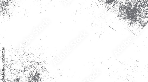 White background with scattered grey grunge textures and speckles in corners