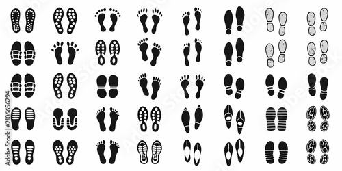 Fotografie Black Silhouette Icons Of Foot And Shoe Prints On White Background