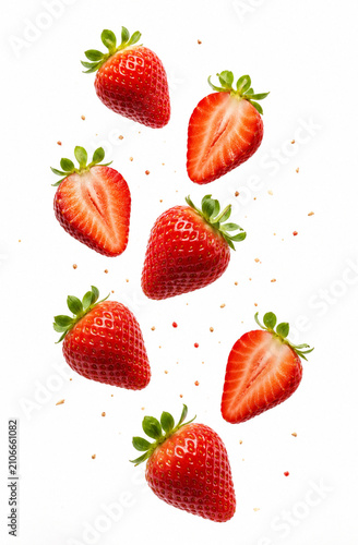 Falling Fresh Whole and Sliced Strawberries Isolated on White Background.