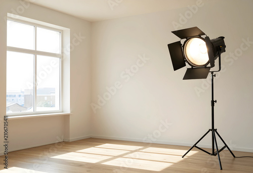 Empty room with a large win...